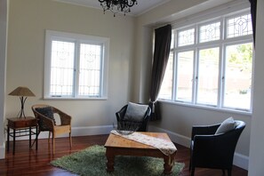 Classic House, 4 Bedrooms | Living area | Flat-screen TV, fireplace - Character on Claudeland (Hamilton)