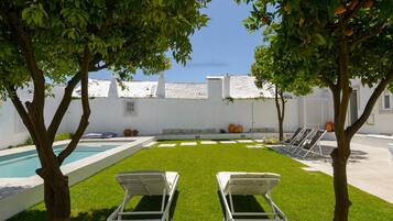 Outdoor pool, pool umbrellas, pool loungers