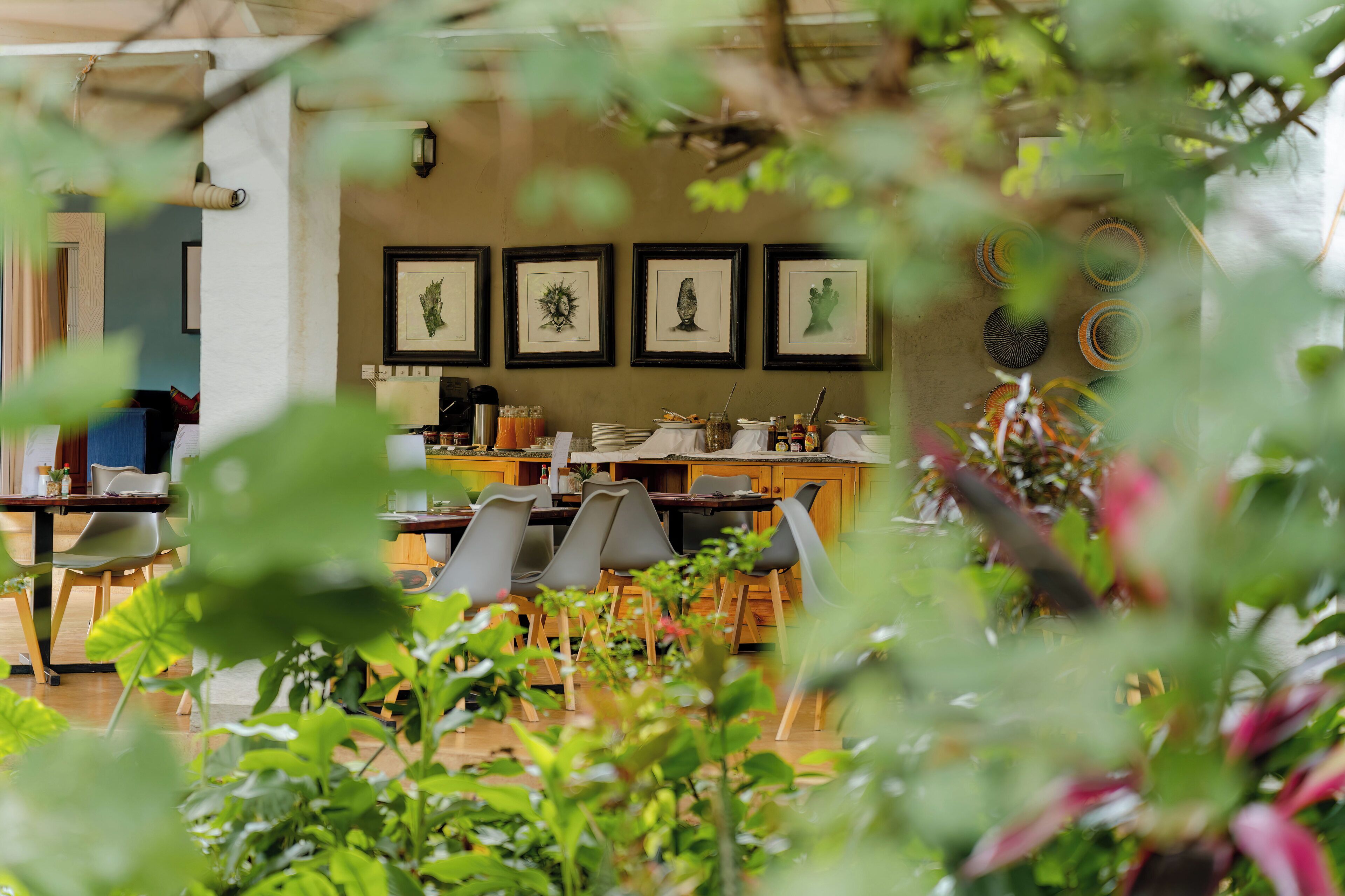 Breakfast, lunch, dinner served; local cuisine 