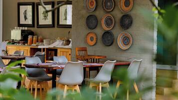 Breakfast, lunch, dinner served; local cuisine