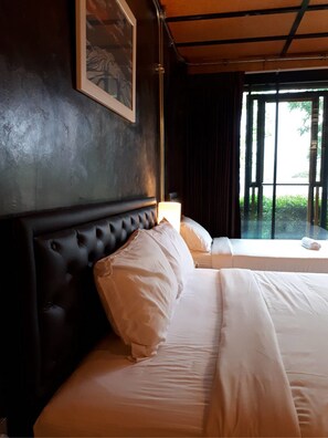 Standard Triple Room | Blackout drapes