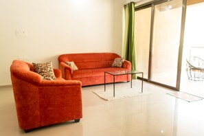 Appartement Deluxe, 1 chambre | Coin séjour