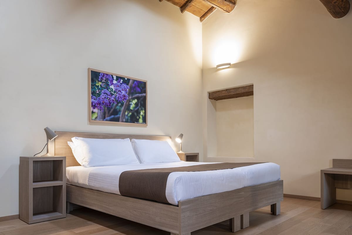 Triple Room | Minibar, in-room safe, desk, soundproofing