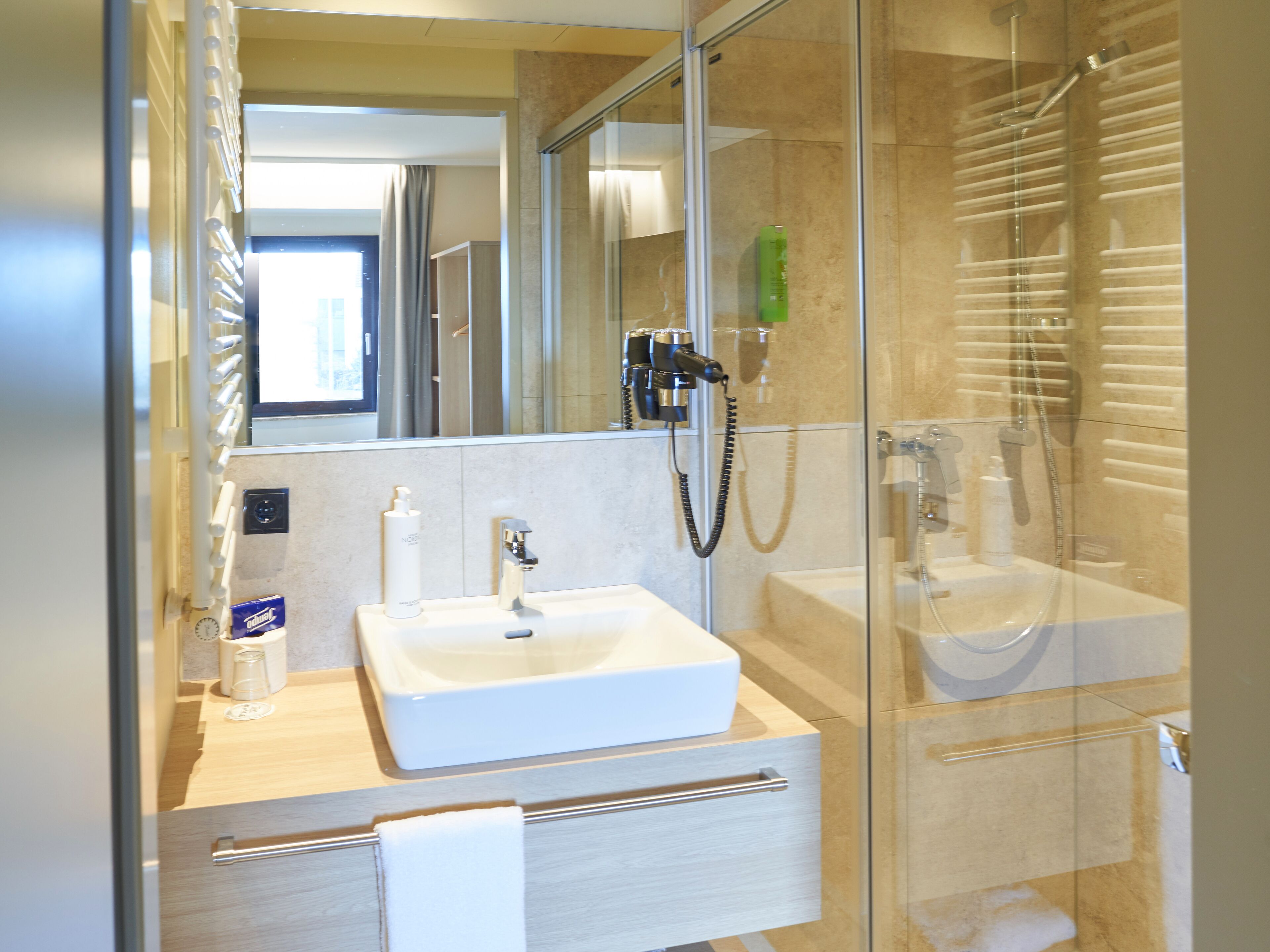 superior double room | bathroom | shower, free toiletries, hair dryer, towels