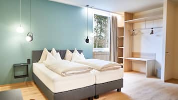 Basic Studio | Hypo-allergenic bedding, desk, laptop workspace, soundproofing