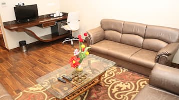 Presidential Suite, 1 Bedroom | Living room | Flat-screen TV