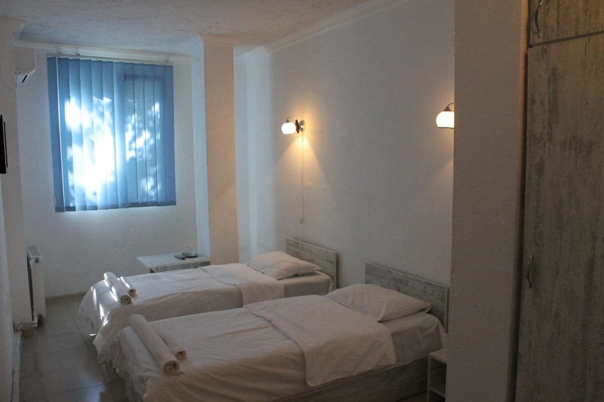 1 habitación y ropa de cama de alta calidad