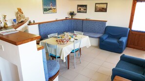 Panoramic Condo, 2 Bedrooms, Sea View, Beachfront | Living area - La Baia Apartments (San Vero Milis)