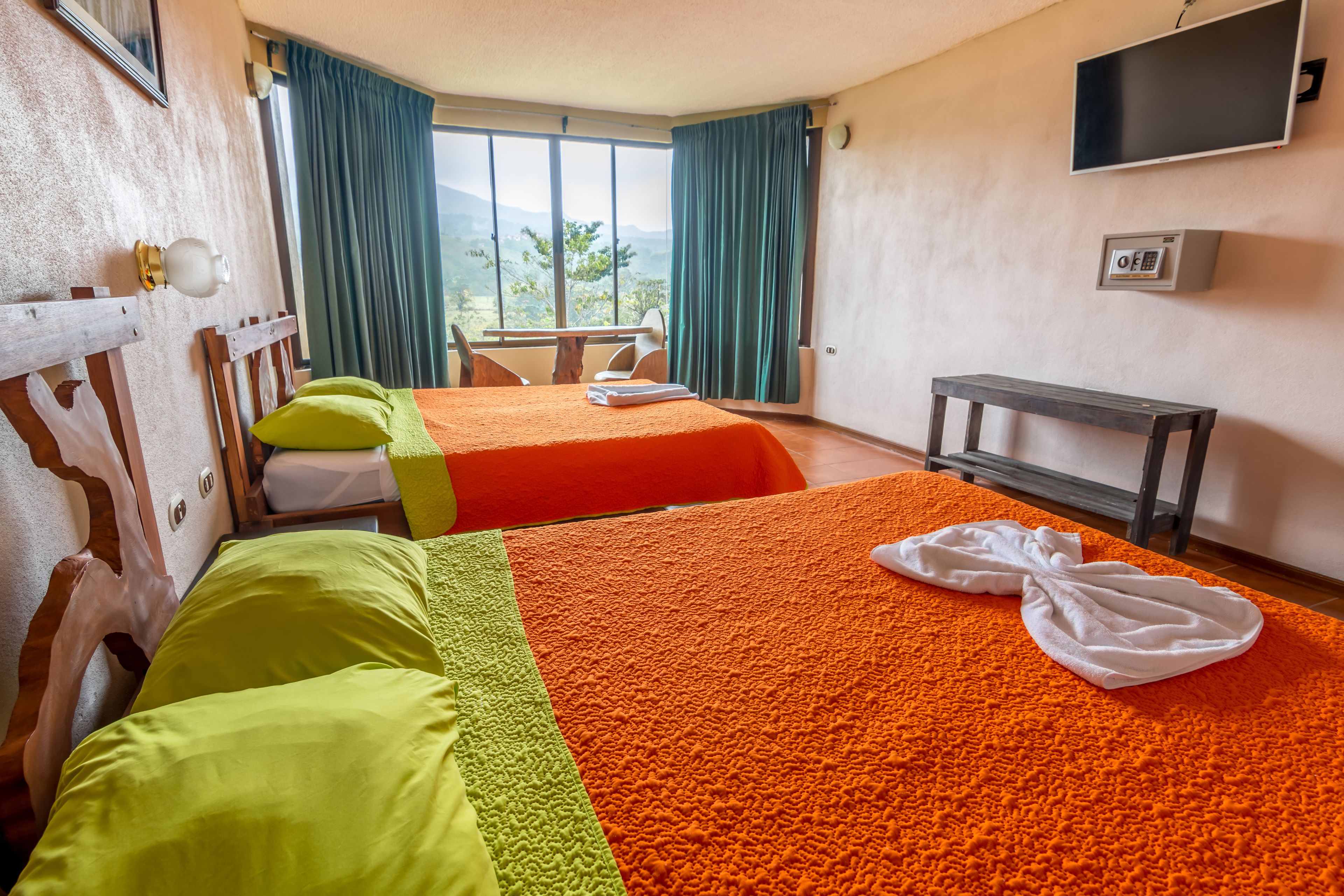 deluxe double room, 2 queen beds | in-room safe, iron/ironing board