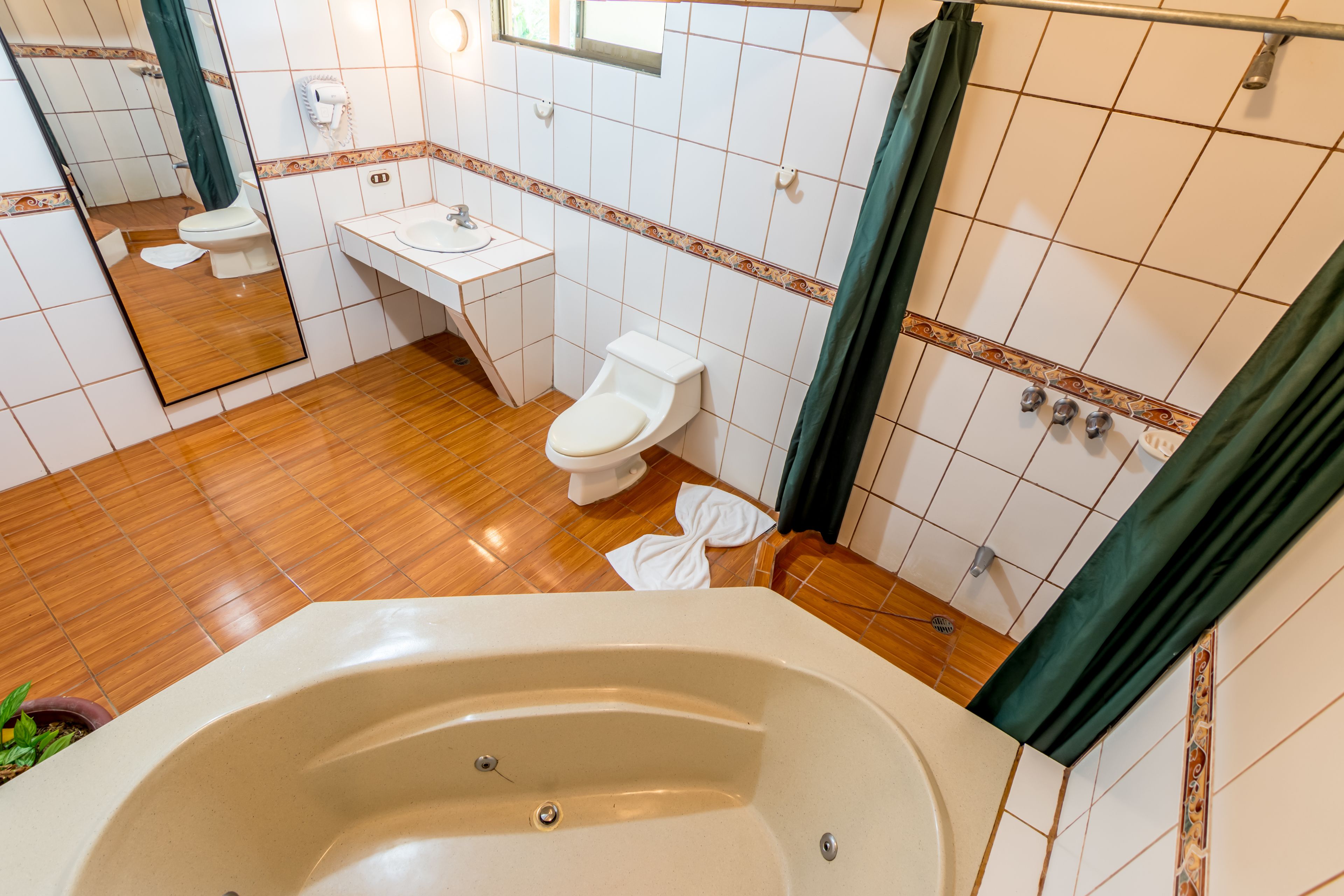 junior suite, 2 queen beds | bathroom | shower, hair dryer, towels