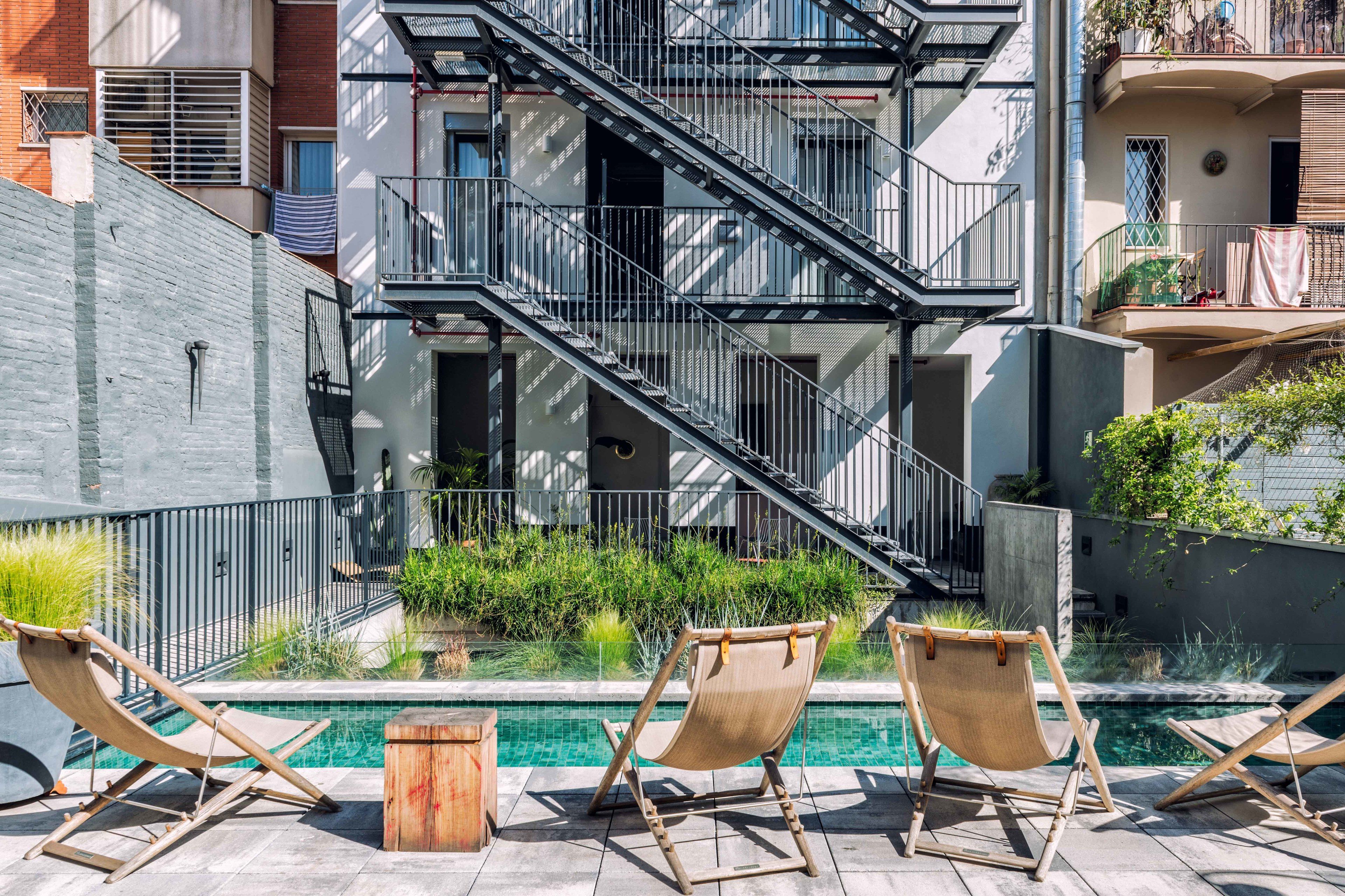 outdoor pool, pool umbrellas, pool loungers