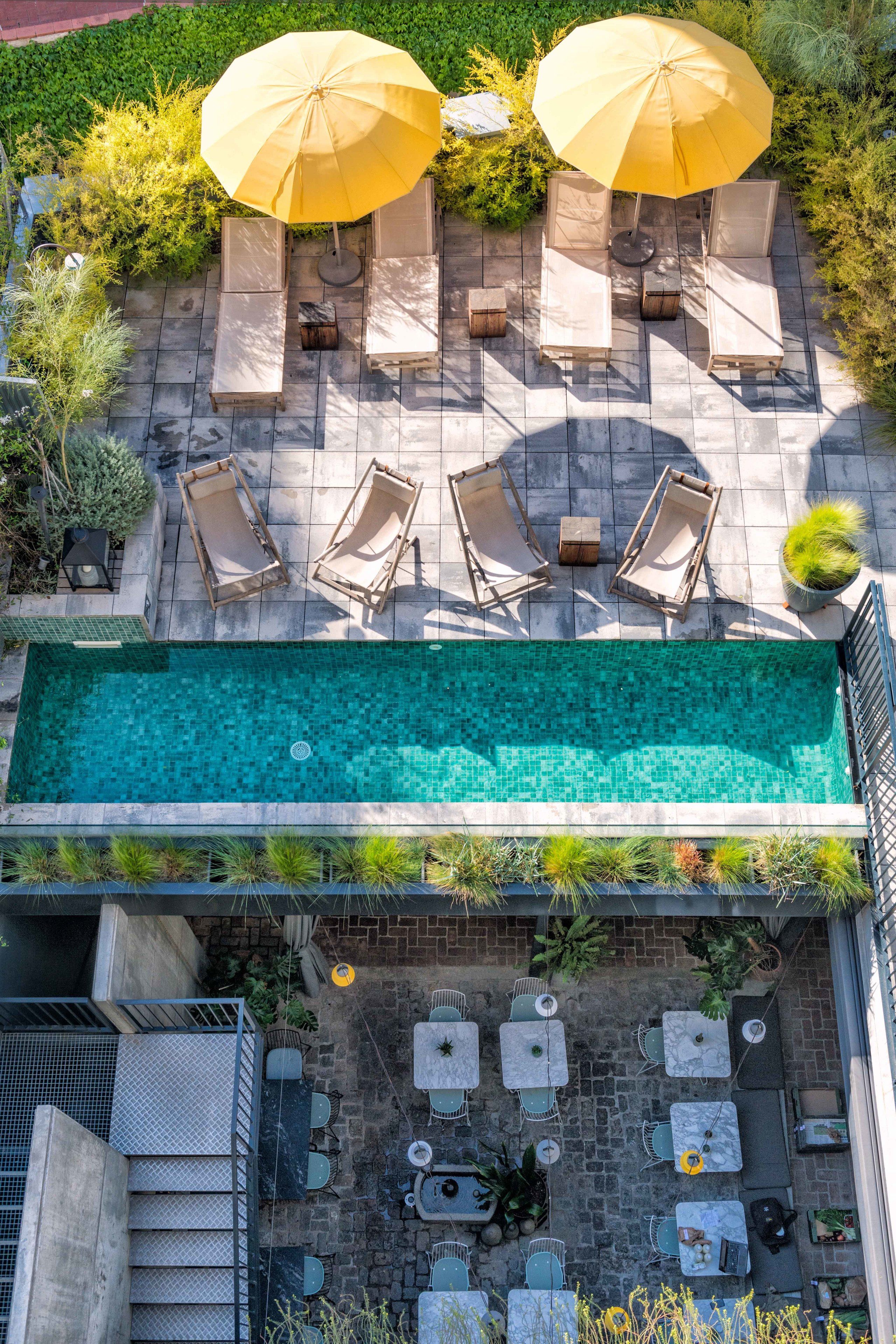 outdoor pool, pool umbrellas, pool loungers