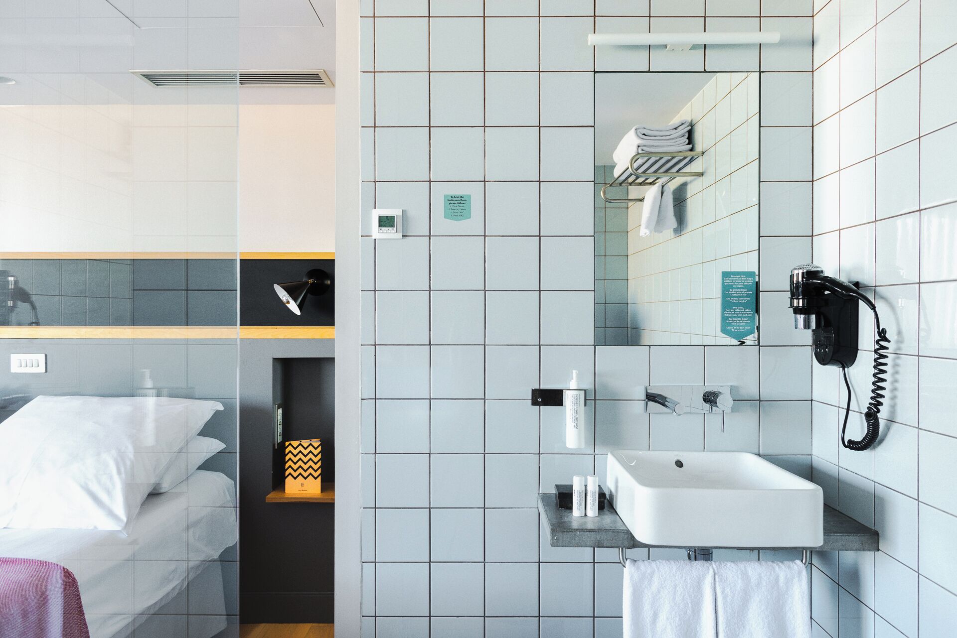 shower, designer toiletries, hair dryer, towels