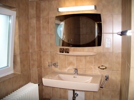 Apartment, 2 Bedrooms, Balcony | Bathroom | Separate tub and shower, hair dryer, towels