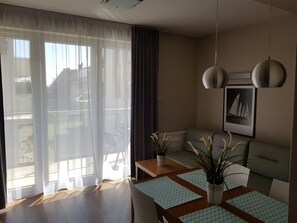 Apartment (3 adults) | Living area - Apartamenty w Marina Jastarnia (Jastarnia)