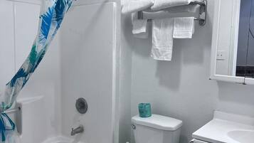 Premium Room, 1 King Bed, Kitchenette | Bathroom | Free toiletries, hair dryer, towels