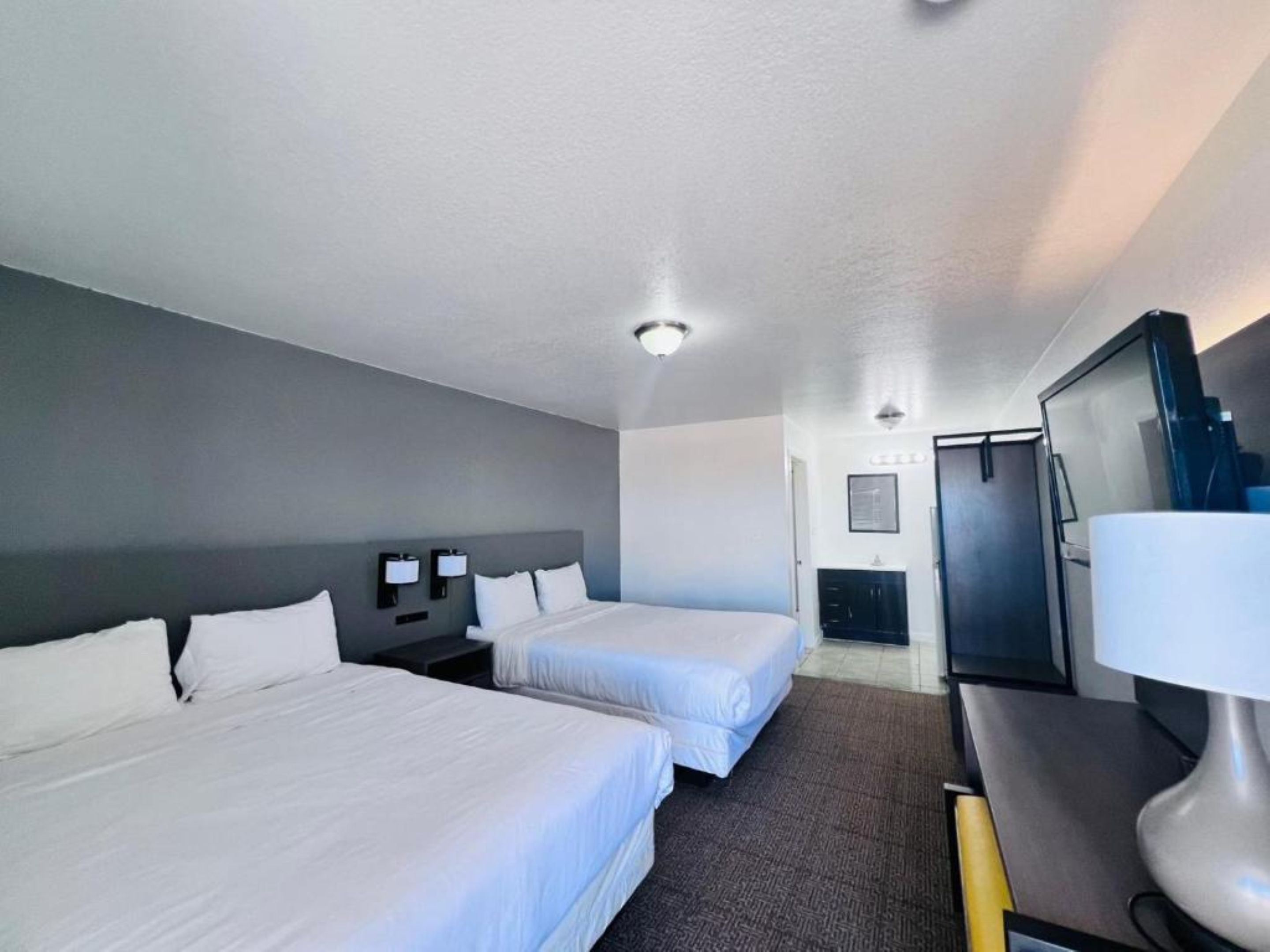 Room, 2 Queen Beds | Desk, iron/ironing board (on request), WiFi (free), bed sheets