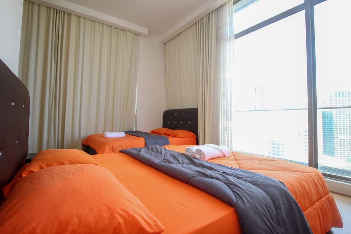 Executive Apartment, 3 Bedrooms, 2 Bathrooms, City View | 2 bedrooms, in-room safe, desk, iron/ironing board
