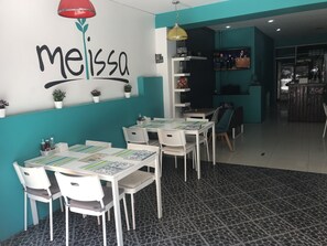 Breakfast, lunch, dinner served; local and international cuisine 