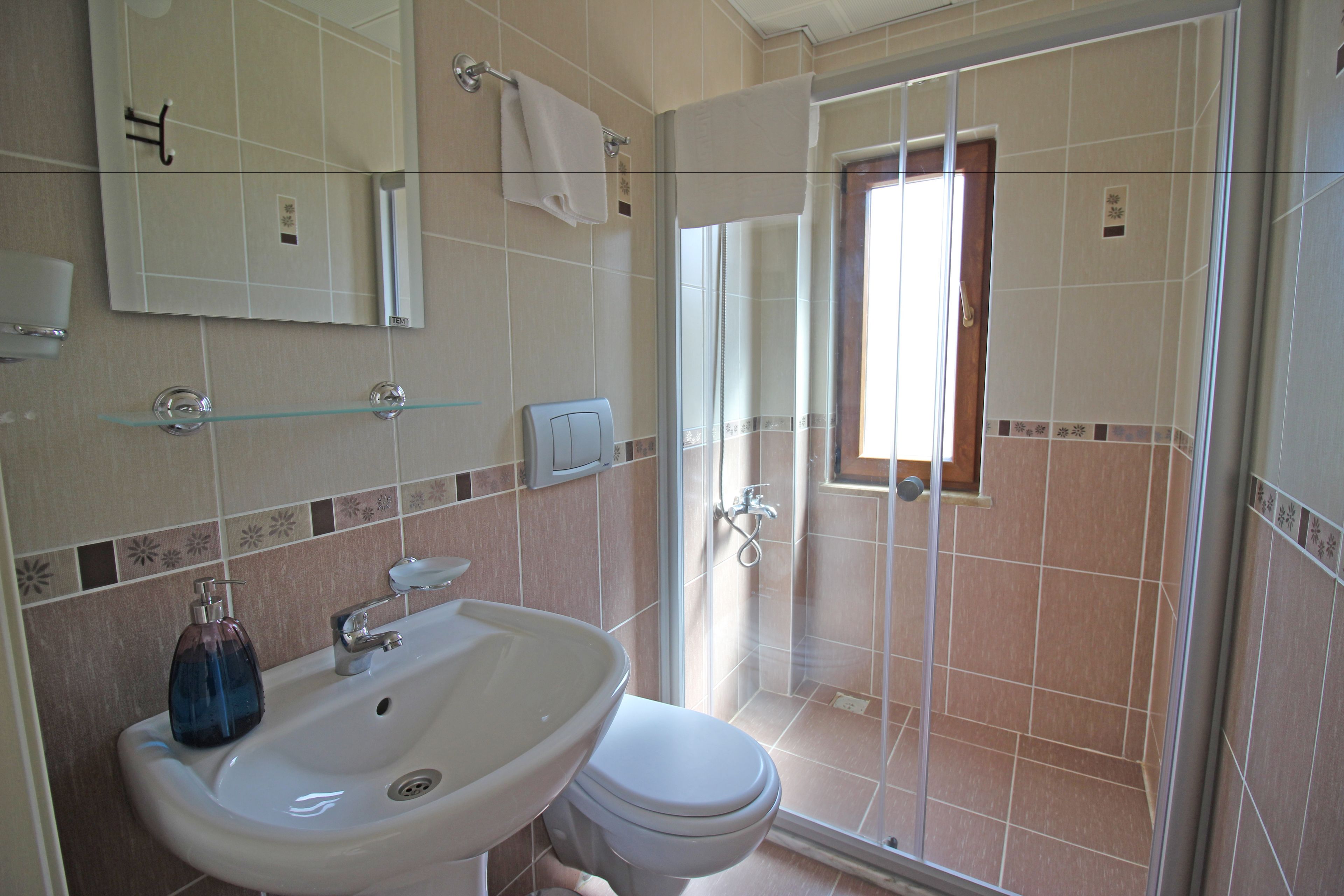 shower, free toiletries, hair dryer, slippers