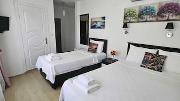 Standard Triple Room | 1 bedroom, minibar, free WiFi, bed sheets