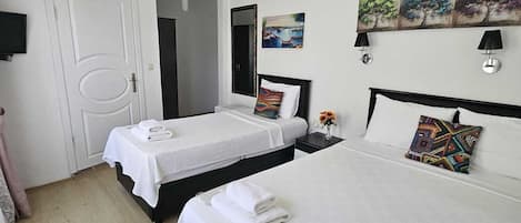 Standard Triple Room | 1 bedroom, minibar, free WiFi, bed sheets