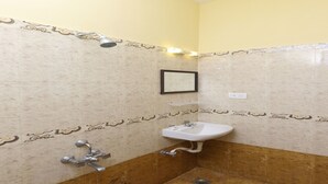 Double or Twin Room | Bathroom | Shower, rainfall showerhead, free toiletries, towels - OYO 970 MNR Grand (Chennai)
