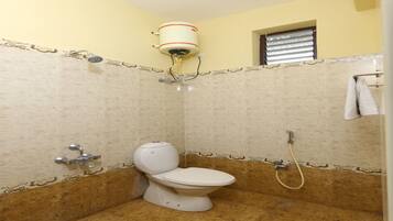 Double or Twin Room | Bathroom | Shower, rainfall showerhead, free toiletries, towels