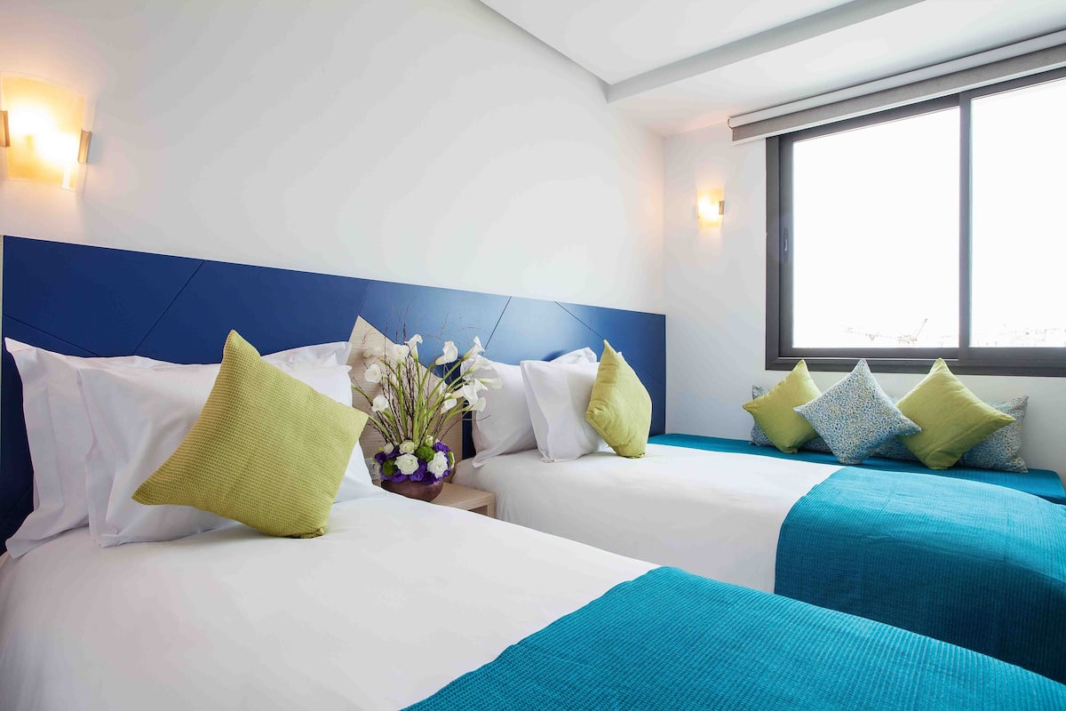 family room | in-room safe, desk, laptop workspace, blackout curtains