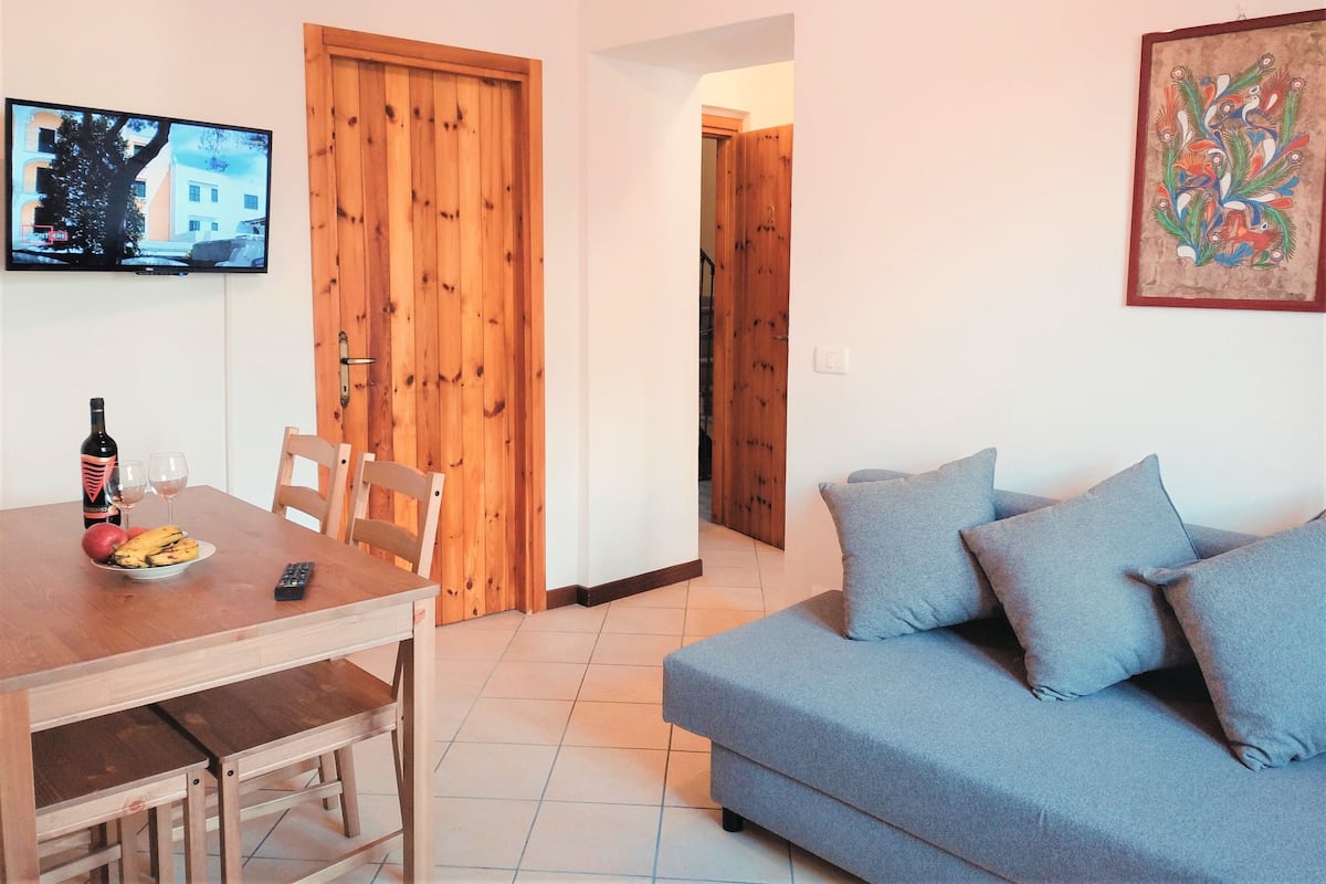 Apartment | Living area | 36-inch flat-screen TV with cable channels, TV