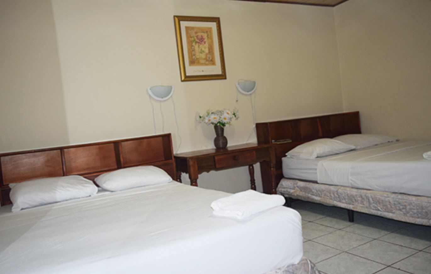 Basic Quadruple Room, Non Smoking | Desk, free WiFi, bed sheets