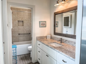 Combined shower/tub, hair dryer, towels, soap