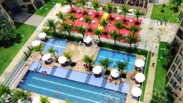 Basic Apartment | Pool | 3 outdoor pools, pool umbrellas, pool loungers