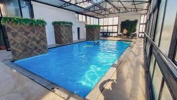 Indoor pool, sun loungers