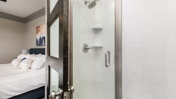 Combined shower/tub, hair dryer, towels, soap