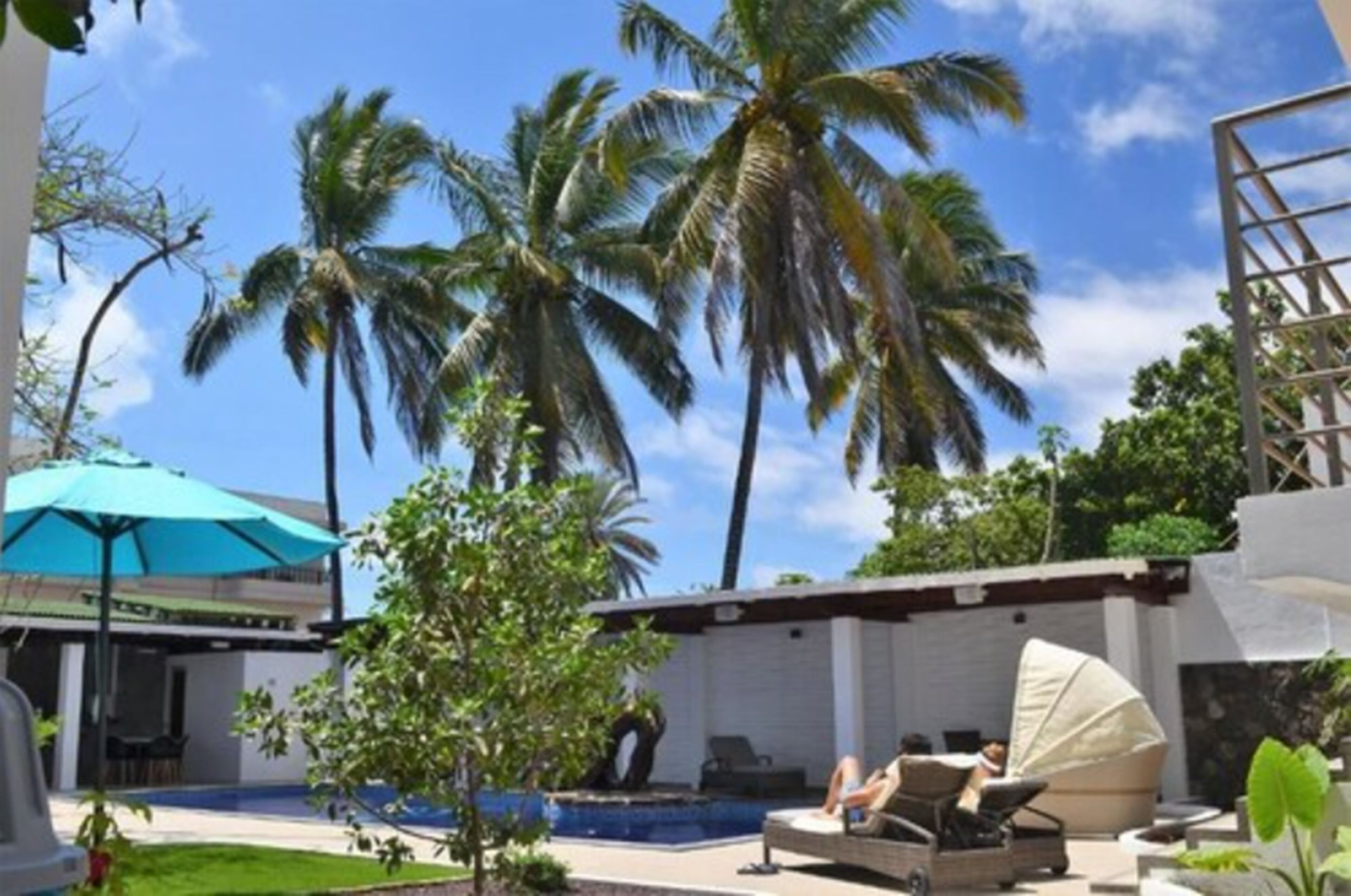 outdoor pool, pool umbrellas, pool loungers