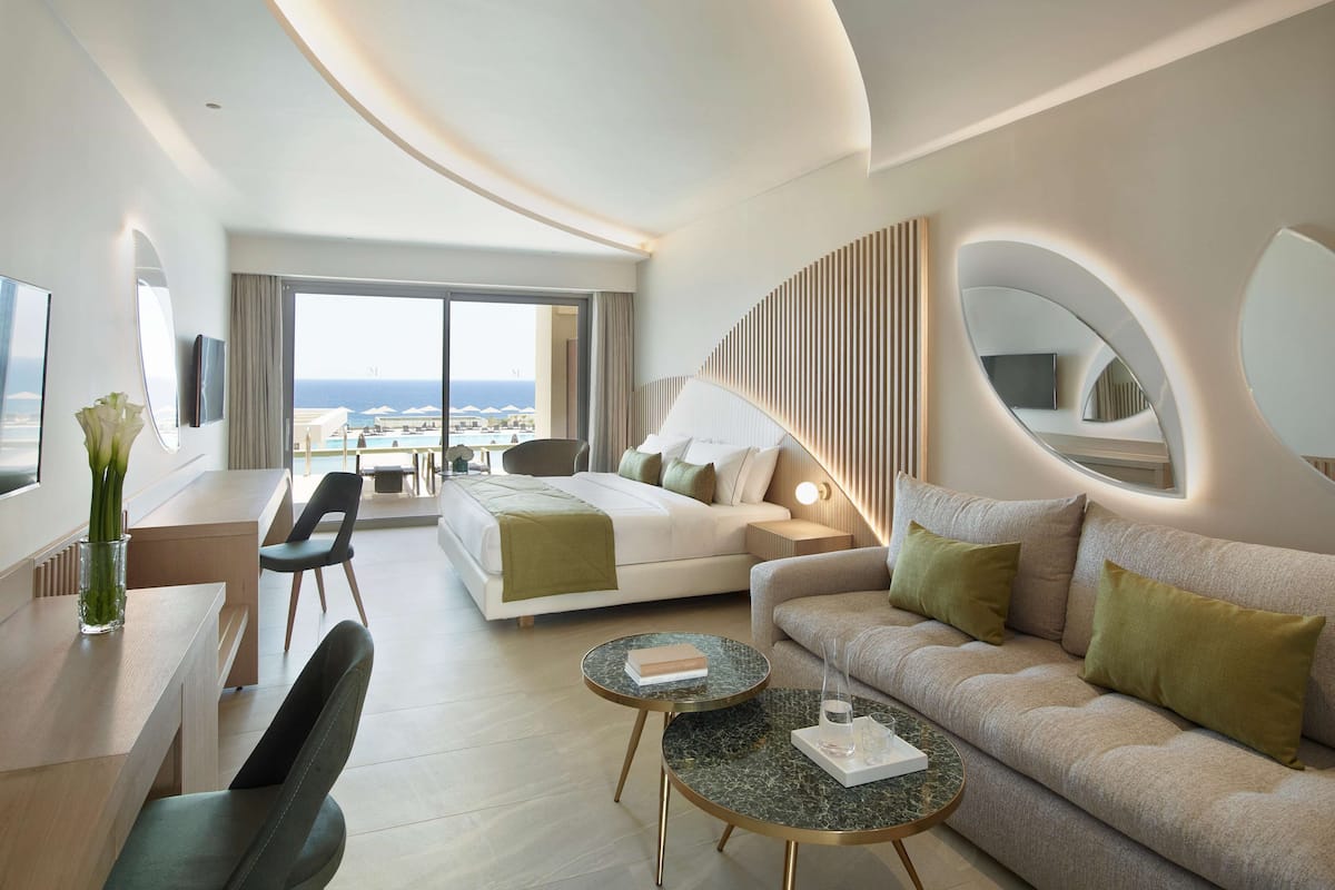 Junior Suite, Pool Access, Sea View (Swim up) | 1 bedroom, premium bedding, free minibar, in-room safe