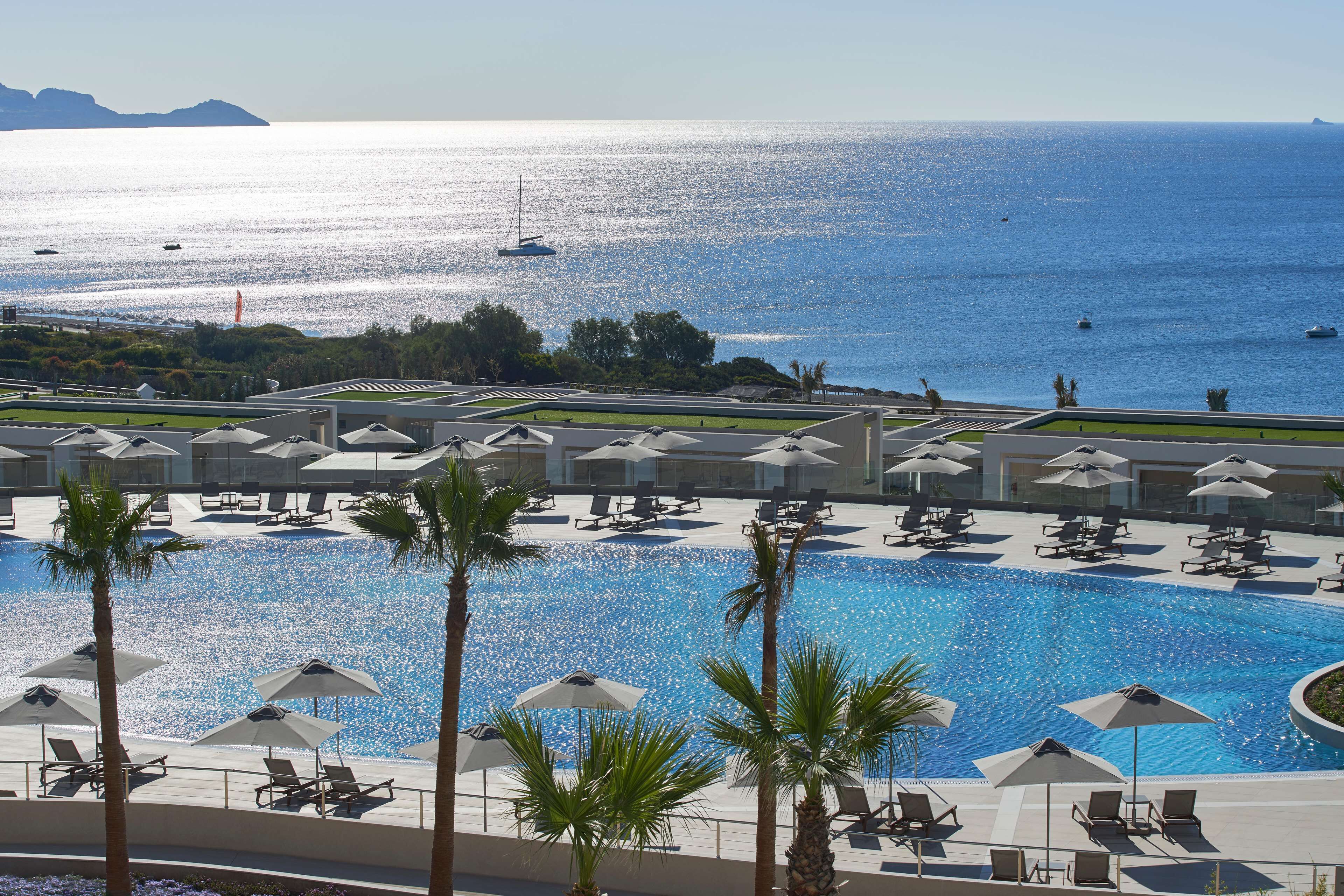 Indoor pool, outdoor pool, pool umbrellas, pool loungers