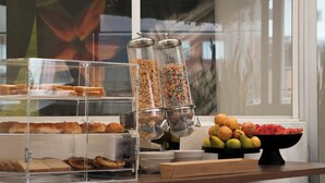 A breakfast buffet with various pastries, cereals, and fruits. - Hemma Bogotá Chapinero Premium Suites Hotel (Bogotá)