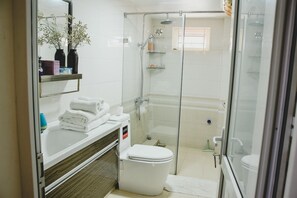 Room, 2 Queen Beds | Bathroom | Shower, free toiletries, towels