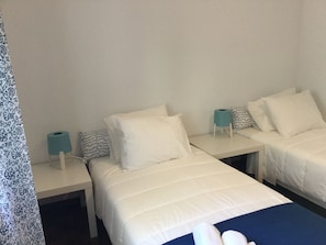 2 habitaciones, tabla de planchar con plancha, wifi y ropa de cama 