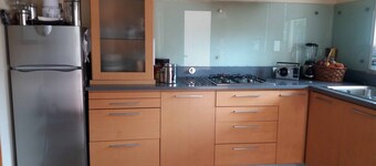 Modern villa, set in a green spot, ideal for families or groups.