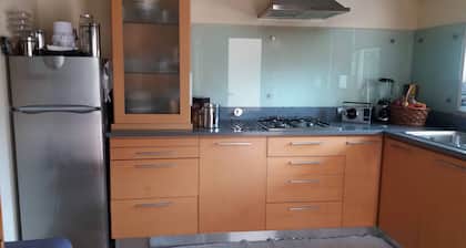 Modern villa, set in a green spot, ideal for families or groups.