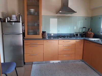 Modern villa, set in a green spot, ideal for families or groups.