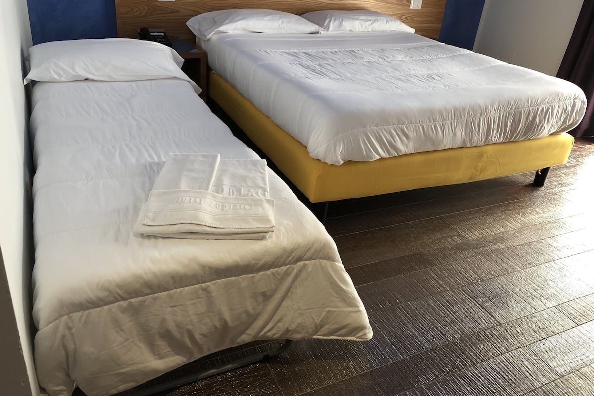 triple room, sea view | minibar, in-room safe, desk, soundproofing