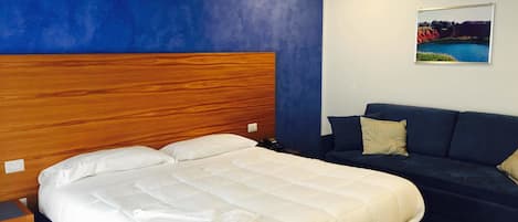 Suite – junior | Minibar, safe på rommet, skrivebord og lydisolert