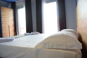 Family Room | Minibar, in-room safe, desk, soundproofing - Hotel Zodiaco (Porto Cesareo)