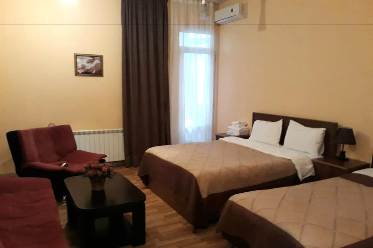 Standard Triple Room | Desk, iron/ironing board, free WiFi, bed sheets