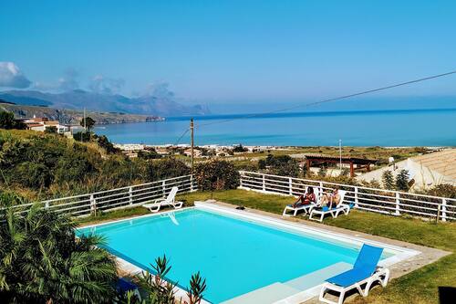 Seasonal outdoor pool, a rooftop pool, pool umbrellas, pool loungers