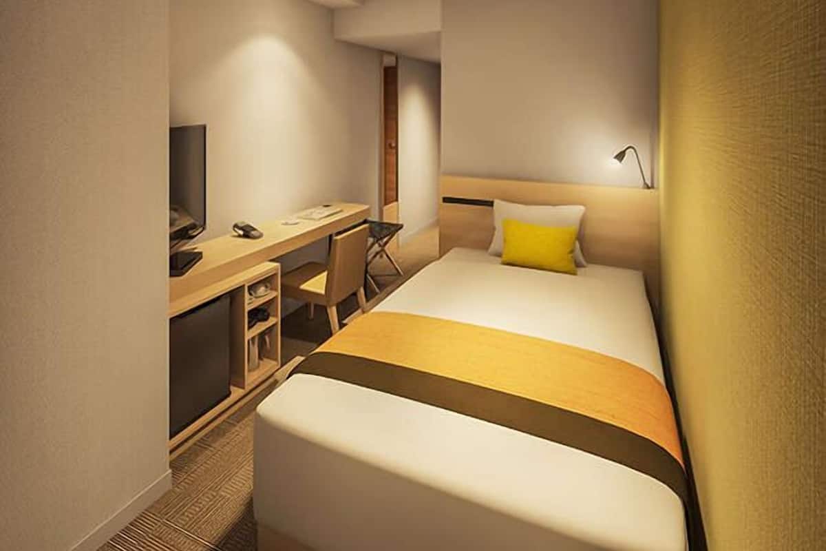 Een bureau, geluiddichte muren, gratis wifi, beddengoed